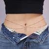 A Woman Wearing A Sexy Belly Chain with Round Beaded Chains Stacked on Top of Each Other in A Street Style