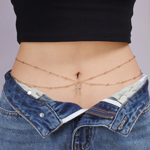 A Woman Wearing A Sexy Belly Chain with Round Beaded Chains Stacked on Top of Each Other in A Street Style