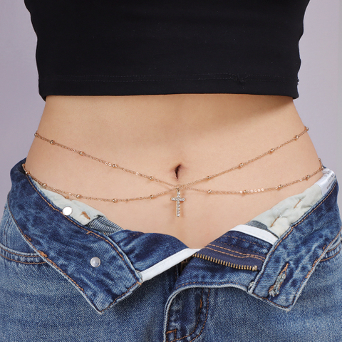 A Woman Wearing A Sexy Belly Chain with Round Beaded Chains Stacked on Top of Each Other in A Street Style